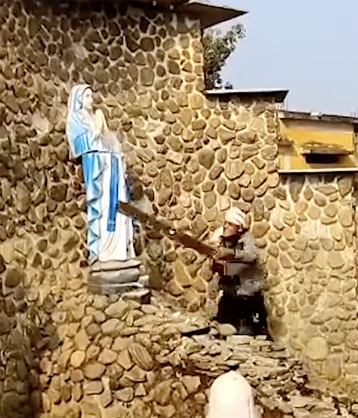 Destroying a statue at a Catholic church